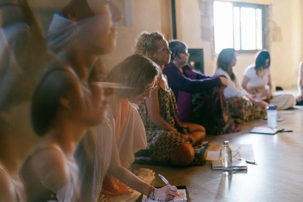 Mature spiritual girls on yoga retreat