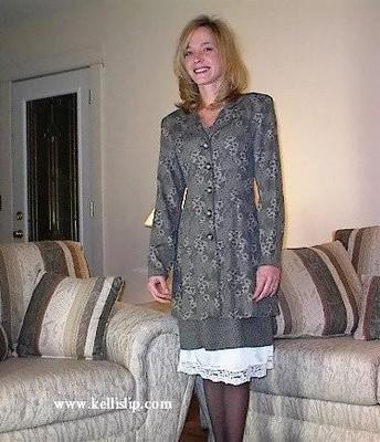 Kelli SG Grey suit, white full slip in the living room