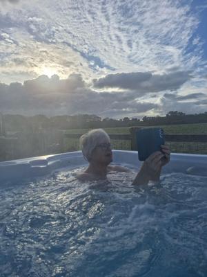 Mom topless in hot tub….teasing son
