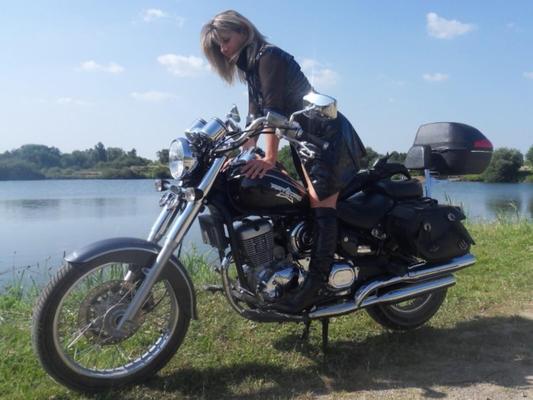 Lisa in a slut outfit on the motorcycle